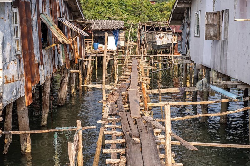Wooden bridge in the fishing village of Ban Ao Salad, Ko Kut Island or Koh Kood Island in the Gulf of Thailand
