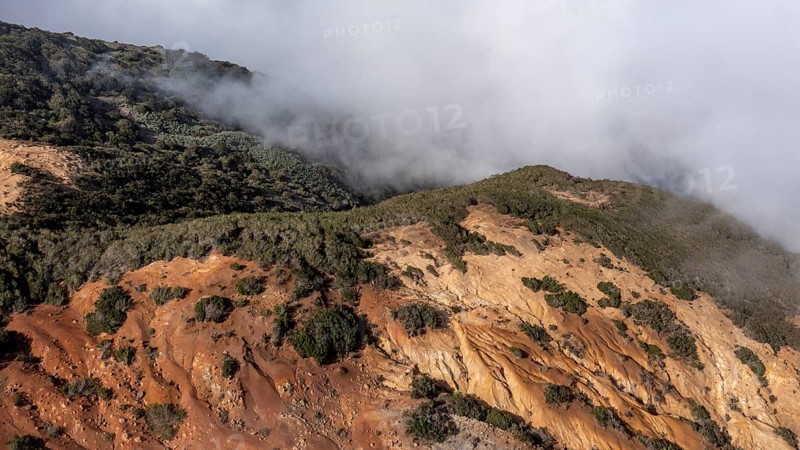 Clouds of fog, yellow earth, erosion, near Arguamul, La Gomera, Canary Islands, Spain, Europe