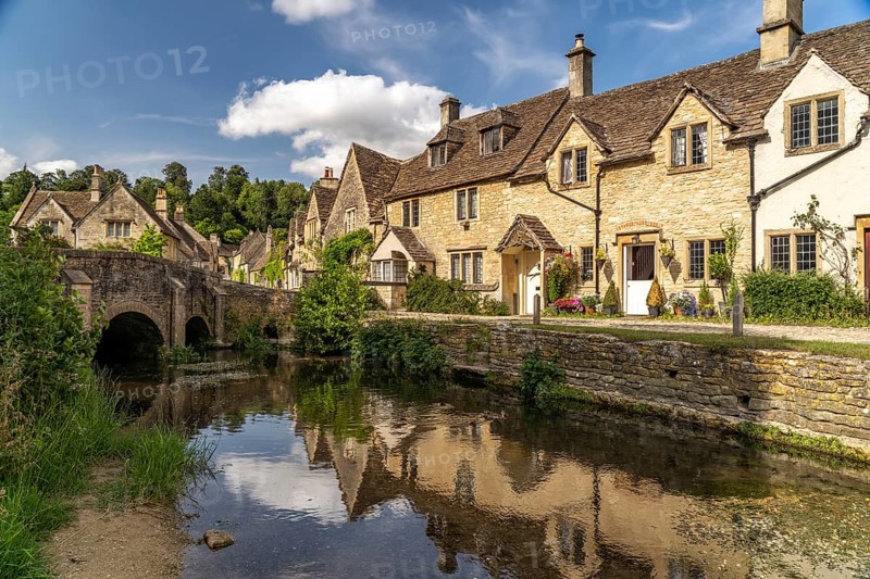 The village of Castle Combe on the River Bybrook, Cotswolds, Wiltshire, England, Great Britain