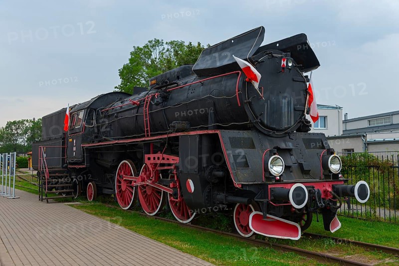 Front view of a black steam locomotive with red details in an open-air museum, Polish steam locomotive OL 49-11, railway museum, Elk, Elk, Lyck, Warmia-Masuria, Poland, Europe