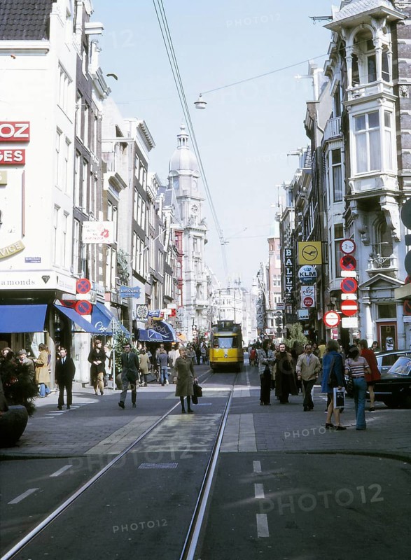 Tram and people on Leidsestraat, Amsterdam city centre, Netherlands