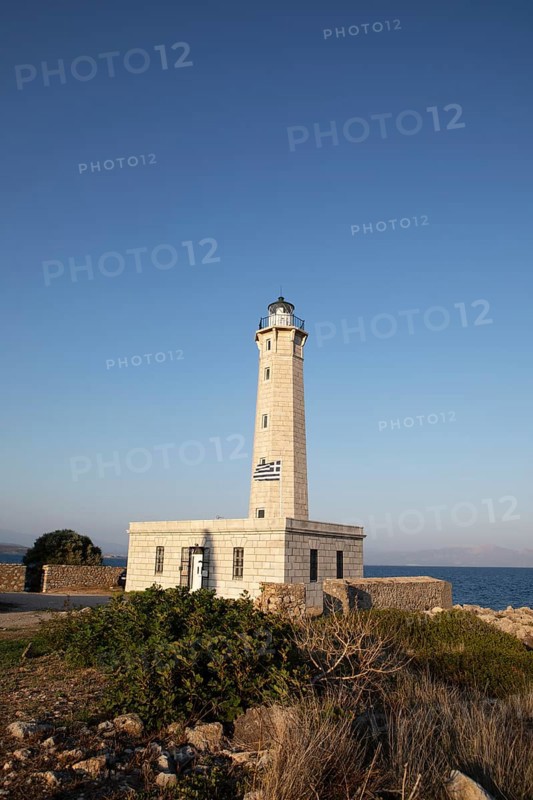 Octagonal lighthouse on the small island of Kranai in the evening light, Gythio or Gythion on the Laconian Gulf, Mani Peloponnese, Greece, Europe