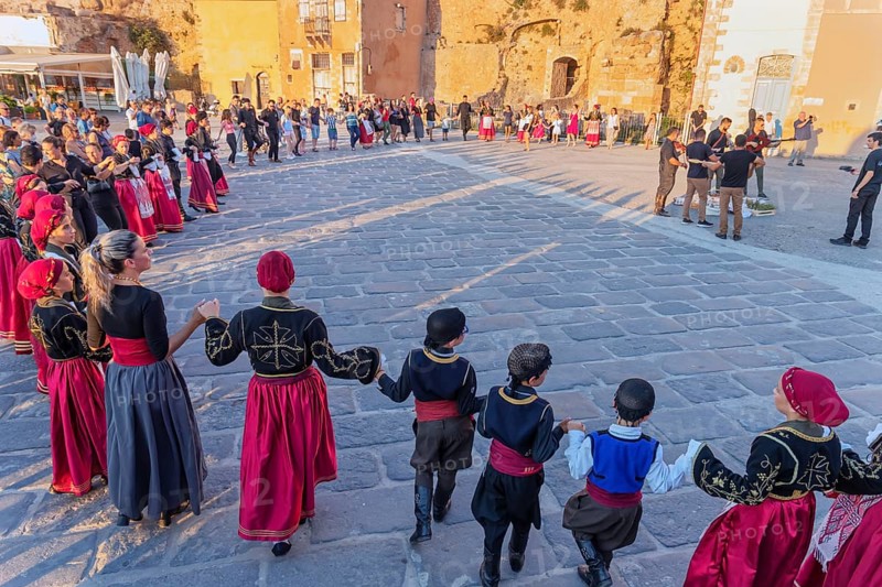 Group of people performing traditional Greek dance, Chania, Crete, Greek Islands, Greece, Europe