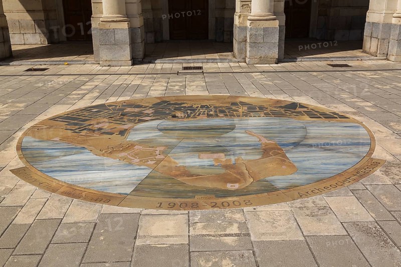 1908-2008 commemorative round marble design with motifs inlaid in paving stones in front of Vittorio Emanuele Theatre building facade, Messina, Sicily, Italy, Europe