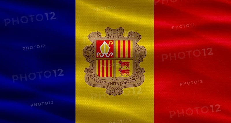 Andorra flag with fabric texture waving. Close up of flag of Andorra with cloth texture
