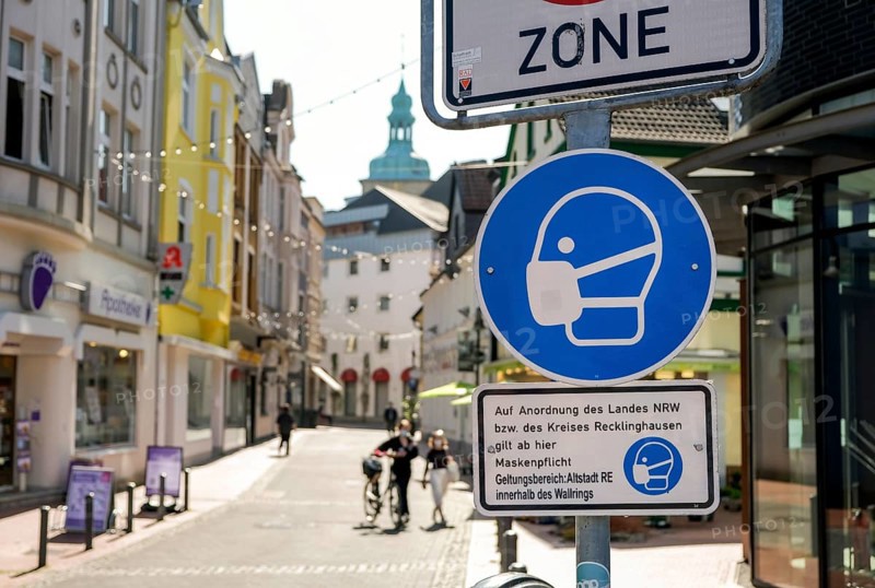 Recklinghausen, North Rhine-Westphalia, Germany - Masks compulsory in the old town of Recklinghausen in times of the corona crisis during the second lockdown, only a few passers-by on the move in the pedestrian zone, shops in North Rhine-Westphalia are partially open under certain conditions, Click & Meet, register online or directly on site and shopping is only possible with a negative current corona test