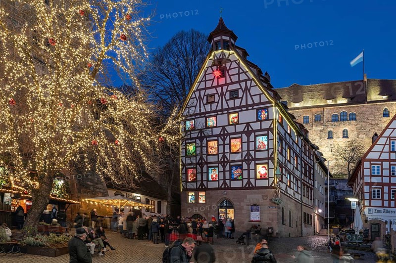 Historic Pilatus House with an Advent calendar designed by the Altstadtfreuden Nuremberg, behind the Imperial Castle, Tiegärtnertorplatz, Nuremberg, Middle Franconia, Bavaria, Germany, Europe