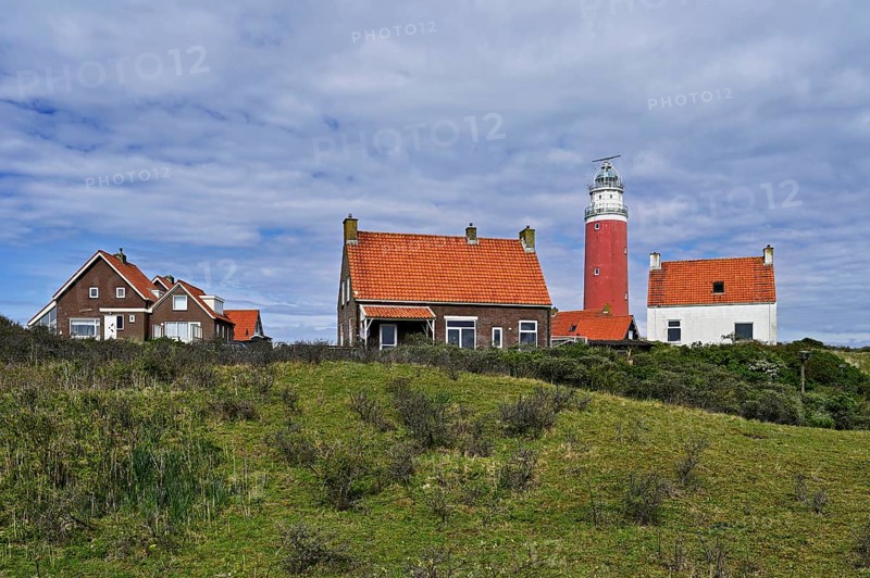 Lighthouse Eierland with houses, De Cocksdorp, Texel, West Frisian Islands, province North Holland, Netherlands