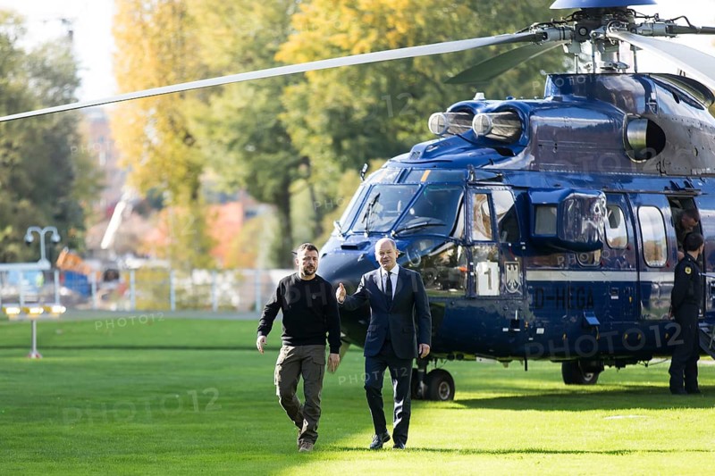 Volodymyr Zelensky (President of Ukraine) is received by Olaf Scholz (Chancellor of the Federal Republic of Germany) after his arrival by helicopter in front of the Federal Chancellery, 11 October 2024