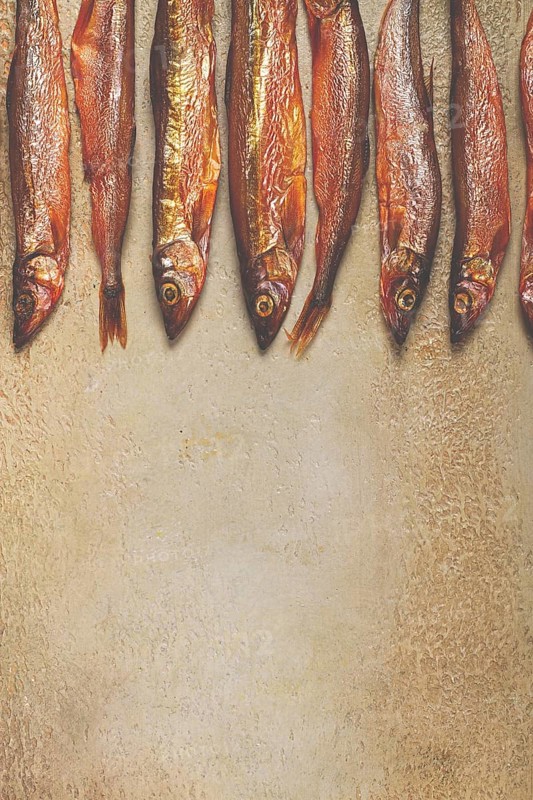 Cold smoked capelin, on the table, top view, no people