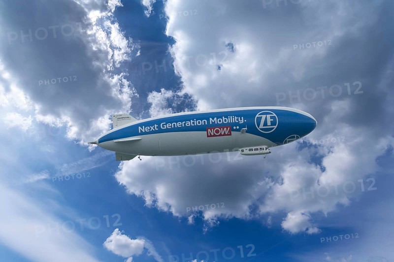 Zeppelin as an advertising medium in the cloudy sky over Rottweil Baden-Württemberg, Germany, Europe