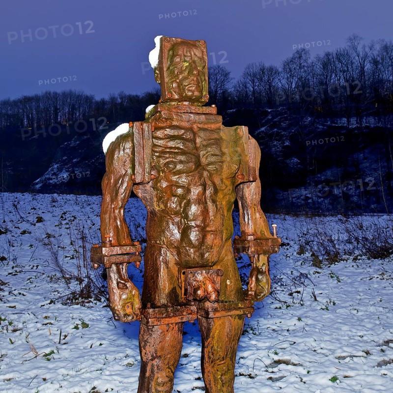 People made of iron, multi-part iron sculpture by Zbigniew Fraczkiewicz at the Henrichshütte in winter, Hattingen, Ruhr area, Germany, Europe