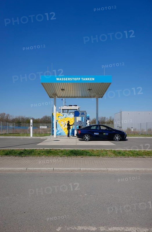 Herten, North Rhine-Westphalia, Germany - Hydrogen car fills up with H2 hydrogen at an H2 hydrogen filling station, press event at the H2 filling station at the h2herten user centre, Hydrogen Competence Centre Herten on the site of the disused Ewald mine in Herten