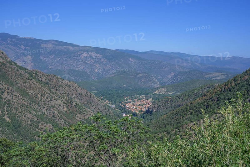 View from the Saint Martin du Canigou Abbey to the village of Casteil, Département Pyrénées-Oriental, France, Europe