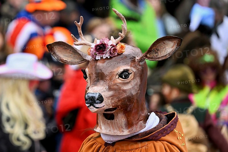 Person masked as a stag at the carnival parade of the Wey guild on Rose Monday, Güdismäntig, Lucerne Carnival 2024, Lucerne, Switzerland, Europe