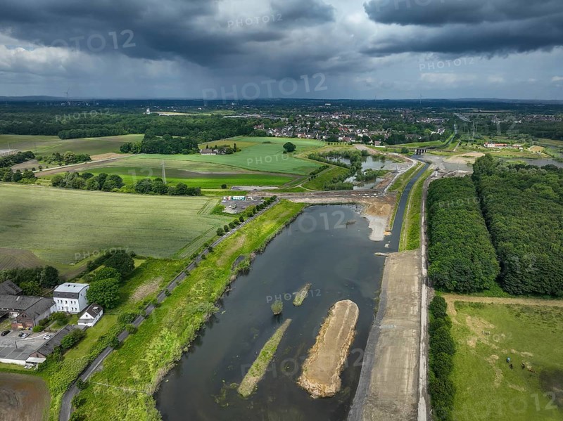 Dortmund / Castrop-Rauxel, North Rhine-Westphalia, Germany, river renaturalisation, renaturation of the Emscher, flood retention basin HRB Mengede. A new floodplain landscape is being created at the Emscher-Auen farm, expanding the area for flood protection during heavy rainfall and for biodiversity. The Emscher, which is currently straightened, will be given curves again and can meander through its new floodplain. Following the construction of a parallel sewer, the Emscher has been completely free of wastewater since 2022. The river was previously an open, above-ground combined sewer with rainwater and wastewater, Europe