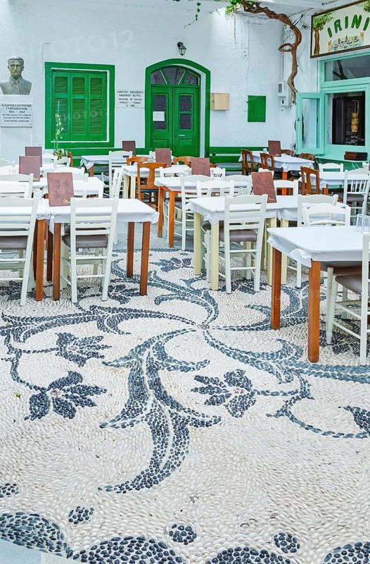 Traditional pebble mosaic adorning Mandraki old town, Mandraki, Nisyros Island, Dodecanese Islands, Greece, Europe