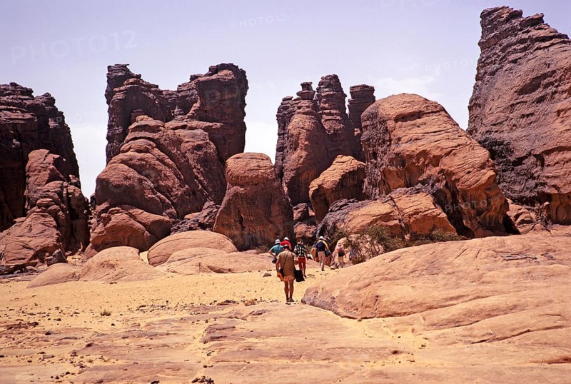 Tourists on their way to cave dwellings, Tassili N'Ajjer National Park, Algeria, North Africa 1973, Africa