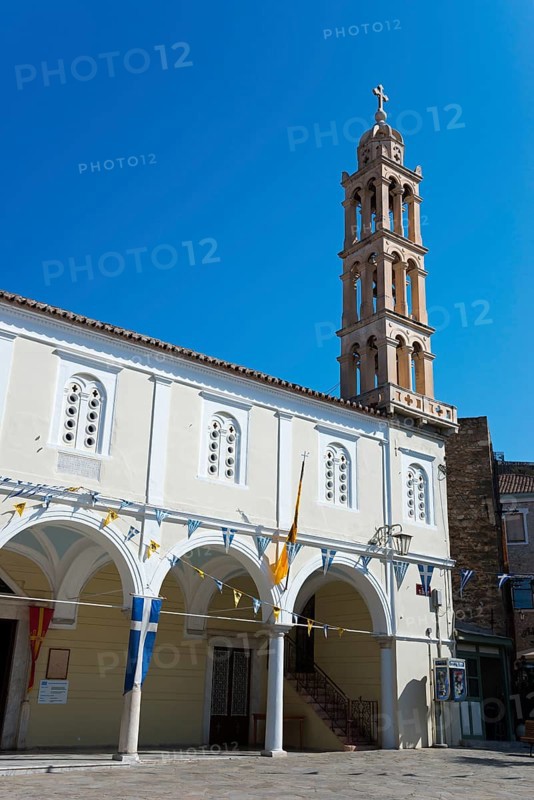 White church building with a high bell tower against a clear blue sky in a city setting, Holy Metropolitan Church of Agios Georgios, St George's Church, Episcopal Cathedral, Nafplio, Nafplio, Nafplion, Argolis, Peloponnese, Greece, Europe