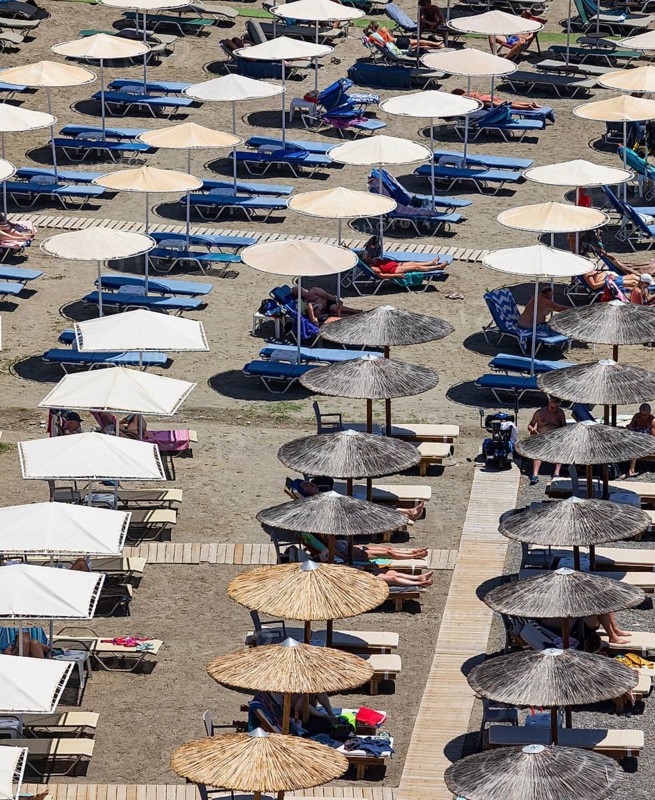 Parasols on Agia Galini beach, Agia Galini, south coast, Crete, Greece, Europe