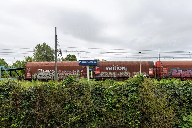 Railway station, Stazione di Pizzighettone with a goods train operated by the logistics company Railion, now DB Schenker Rail. Pizzighettone, Lombardy, Italy, Europe