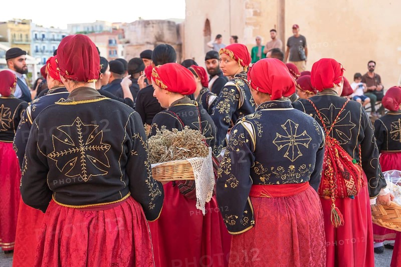 Traditionally dressed Greek women carrying gifts during marriage celebration, Chania, Crete, Greek Islands, Greece, Europe