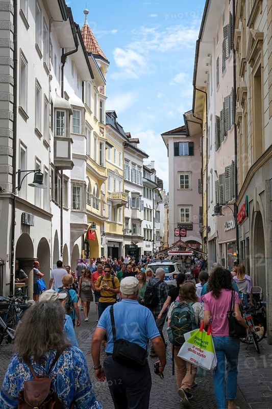 Bolzano, South Tyrol, Italy, Passers-by stroll through the Laubengasse in the old town centre, Europe