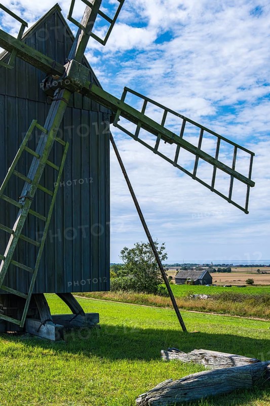 Three traditional historic windmills (Resmo väderkvarnar) in the village of Resmo on Öland, Kalmar län, Sweden, Scandinavia, Europe