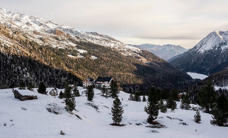 Zufallhütte mountain hut, view of the Martell Valley, snow-covered mountain landscape in winter, Ortler Alps, Vinschgau Valley, Italy, Europe