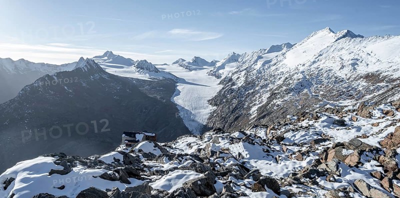 Mountain panorama and glacier, in autumn with snow, view of Gurgler Ferner with summit Hochwilde and Falschungsspitze, in the morning light, Ötztal Alps, Tyrol, Austria, Europe