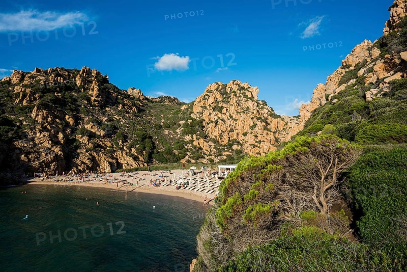 Red rocks and picturesque beach, Spiaggia di Cala li Cossi, Costa Paradiso, Sardinia, Italy, Europe
