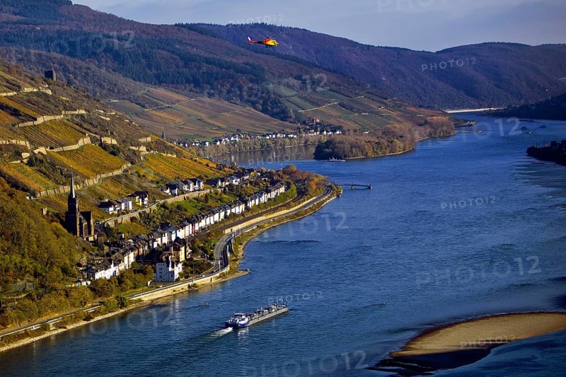 Elevated view of the Rhine and Lorch from Bacharach with barge and helicopter, Upper Middle Rhine Valley, Hesse, Germany, Europe