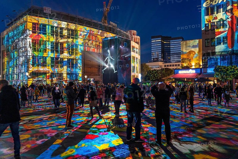 Essen Light Festival, in the city centre, light art on Kennedyplatz, the Berlin artist Daniel Margraf illuminates the large square in the city centre with works of art from the Essen Folkwang Museum, the visitors become part of the pictures that change with every step. North Rhine-Westphalia, Germany, Europe