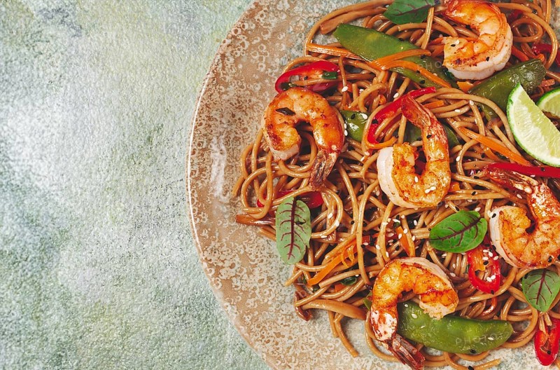 Fried udon noodles with shrimp and vegetables, Asian cuisine, homemade, no people