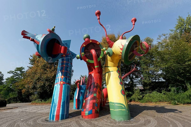 Sculpture of the Nessy family in bright colours, sea monster, aeration structure for Düsseldorf's urban drainage system, Düsseldorf, North Rhine-Westphalia, Germany, Europe