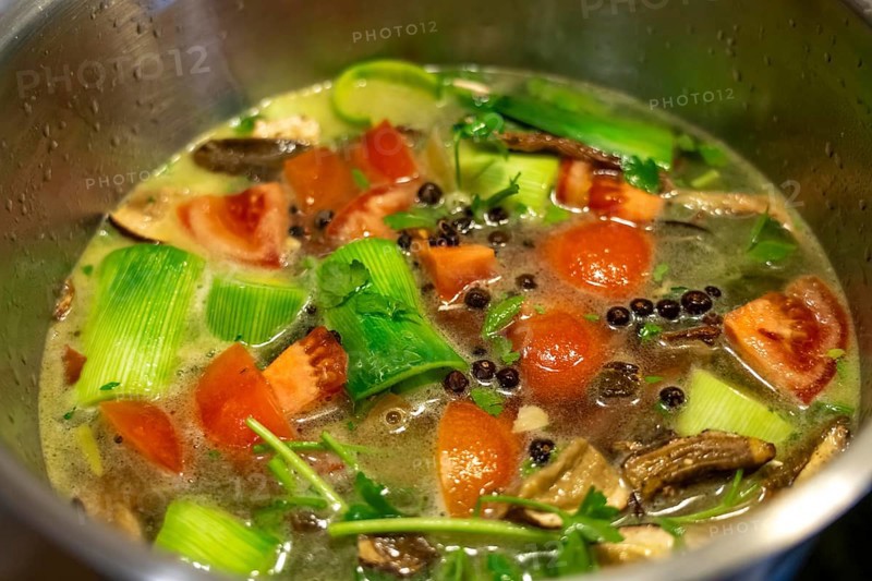 Vegetable soup, or vegetable stock, is cooked with various vegetables, which are slowly simmered with herbs and spices, later strained out, leaving behind a vegetable stock, vegetable stock for further processing, for soups, sauces, etc