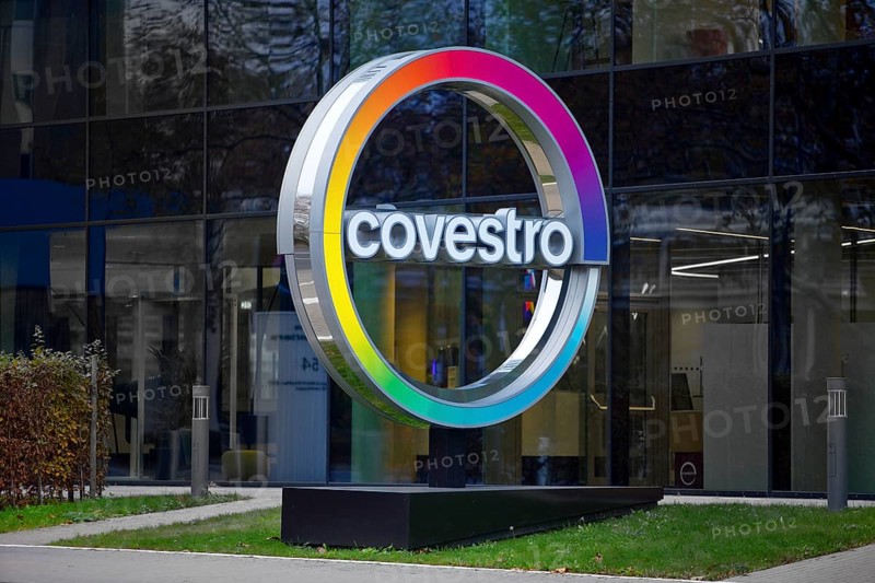 Covestro AG, company logo in front of the corporate headquarters at dusk, Leverkusen, Bergisches Land, North Rhine-Westphalia, Germany, Europe