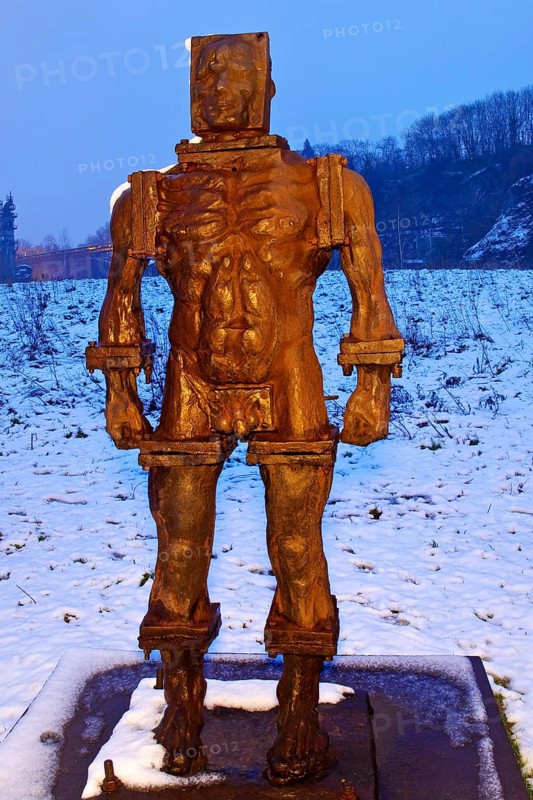 People made of iron, multi-part iron sculpture by Zbigniew Fraczkiewicz at the Henrichshütte in winter, Hattingen, Ruhr area, Germany, Europe