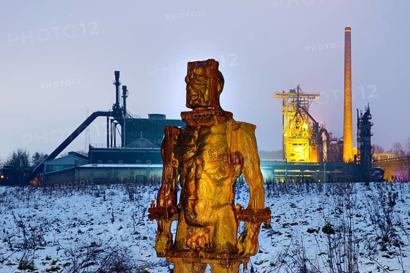 People made of iron, multi-part iron sculpture by Zbigniew Fraczkiewicz in front of the Henrichshütte in winter, Hattingen, Ruhr area, Germany, Europe