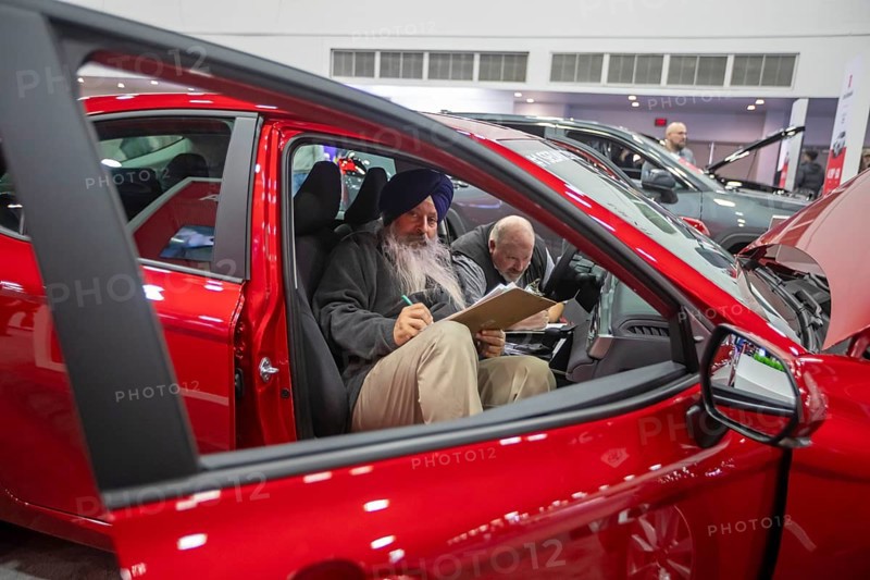 Detroit, Michigan USA - 15 January 2025 - The 2025 Toyota Camry hybrid EV at the 2025 Detroit Auto Show. On Industry Day at the show, auto industry veterans closely examine the vehicles