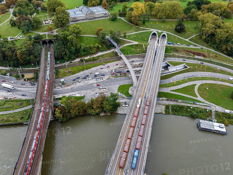 Load test on the Neckar Bridge, aerial view. Due to the unusual design, dimensional checks are mandatory in front of the bridge is opened to trains. Two goods trains weighing a total of 960 tonnes put a load on the 345-metre-long bridge over the Neckar. The bridge is part of the major Stuttgart 21 project. Rosenstein Castle and Rosenstein Park, Stuttgart, Baden-Württemberg, Germany, Europe