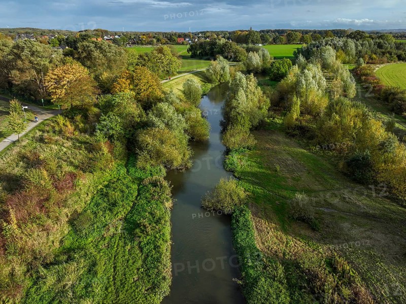 Bergkamen, Ruhr area, North Rhine-Westphalia, Germany, autumn landscape on the Seseke. The renaturalised Seseke, a tributary of the Lippe, has been transformed into a near-natural watercourse, flood protection and biodiversity through newly designed floodplains. Following the construction of a parallel sewer, the Seseke is now free of wastewater, having previously been an open, above-ground wastewater sewer, combined sewer with surface water and wastewater. Theme photo: EU Nature Conservation Act. The EU Nature Conservation Act obliges member states to implement measures to restore nature on at least 20 per cent of the EU's land and sea areas by 2030, Europe