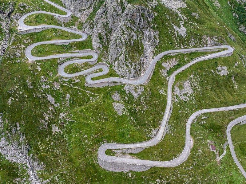 La Tremola, world-famous serpentine road through the Val Tremolo, road construction monument, Alpine pass with 24 hairpin bends. Old Gotthard Pass. Drone photo. Airolo, Canton Ticino, Switzerland, Europe