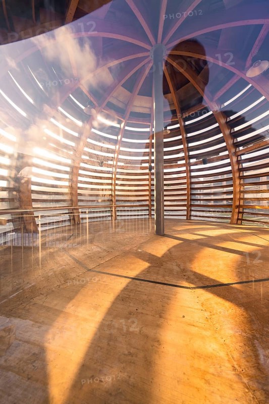 Shot through wooden ball interior view, emphasised by natural light and shadow, forest ball from Landesgartenschau 2012, Nagold, Black Forest, Germany, Europe