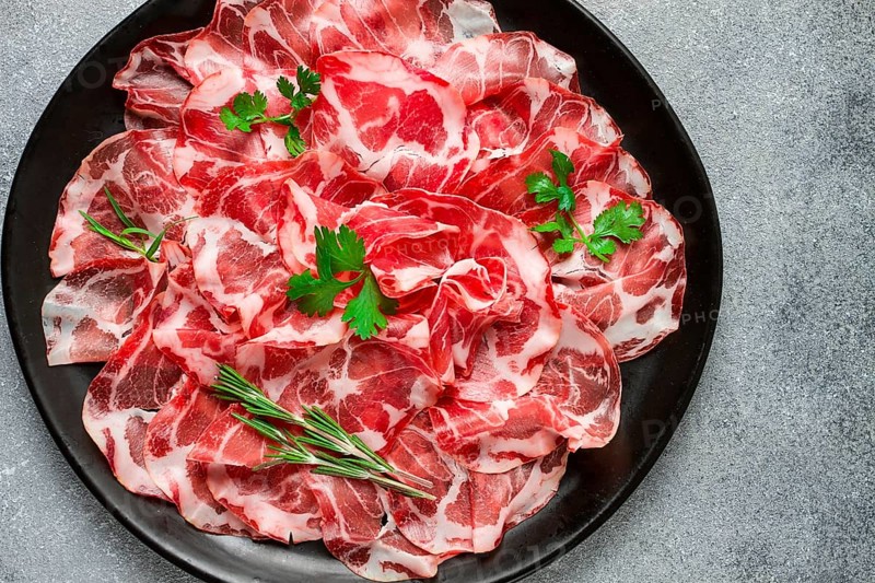 Sliced cured ham, prosciutto, italian dish, delicacy, parma ham, top view, no people