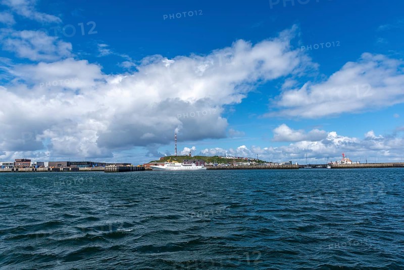 View from south-east to harbour facilities, Unterland and Oberland, offshore island Helgoland, seaside resort ship Funny Girl, blue sky, North Sea, district Pinneberg, Schleswig-Holstein, Germany, Europe