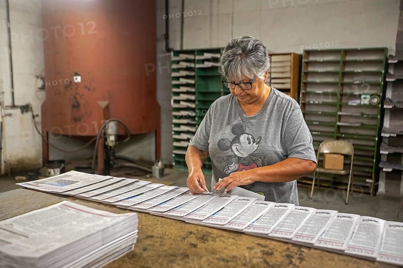 Liberal, Kansas, Lisa Diaz puts mailing labels on copies of the Kiowa County (Colorado) Independent. The Independent is one of many local newspapers from four states printed in the Liberal Leader & Times' printing plant. The Leader & Times hopes this will help keep local journalism alive. Across the country, more than 2, 000 local newspapers have closed in recent years