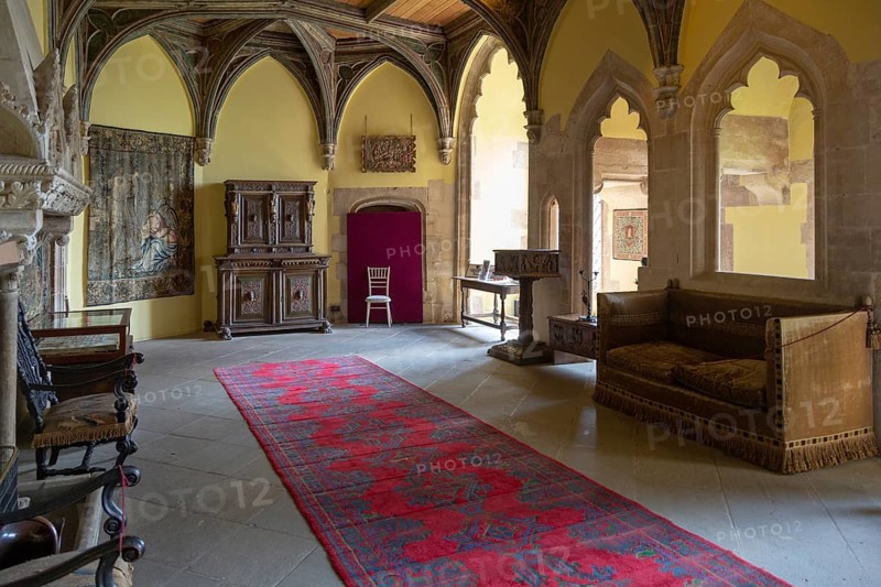 Furniture and wall tapestries in the Morning Room inside Berkeley castle, Gloucestershire, England, UK