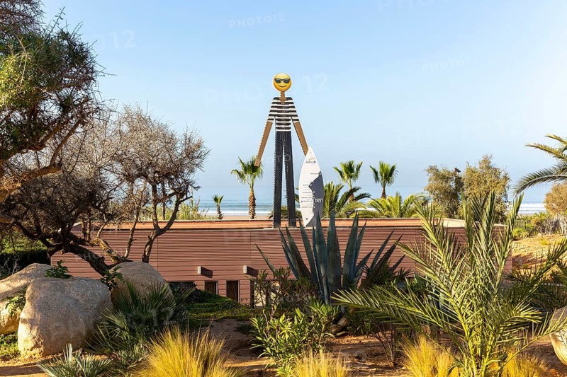Surf school sign figure and surfboard, Radisson Blu Resort, Taghazout Bay Surf Village, Taghazout, Morocco, North Africa, Africa