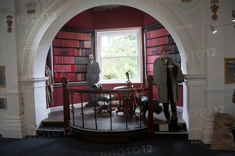 Writer Sir Arthur Conan Doyle and his fictional detective Sherlock Holmes display in Dartmoor national park visitor centre, Princetown, Devon, England, UK